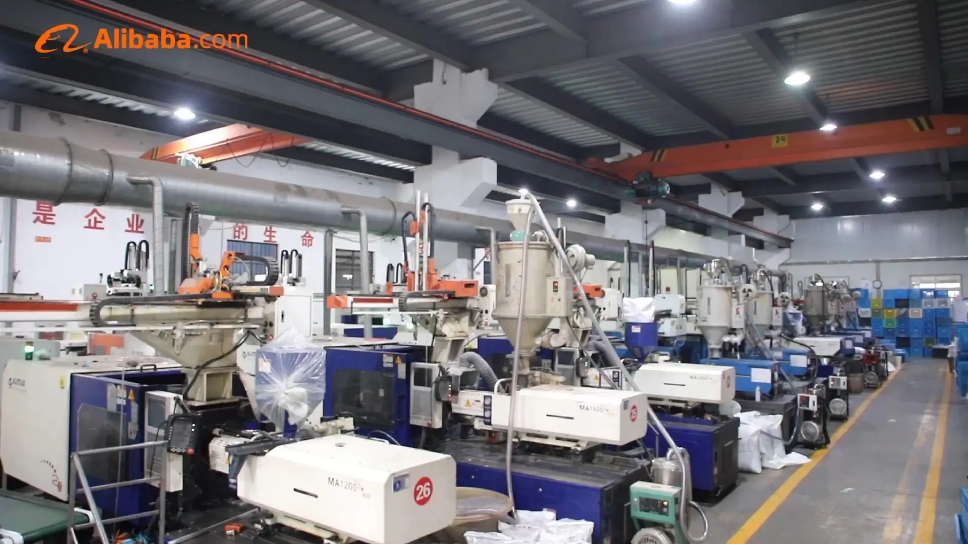 Injection molding machines and material dryers on Seliya's factory floor
